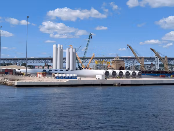 Several New England states are seeing economic growth from the offshore wind industry. Here, blades are prepared for shipping at a pier in New London, Conn. Elizabeth J. Wilson, CC BY-ND